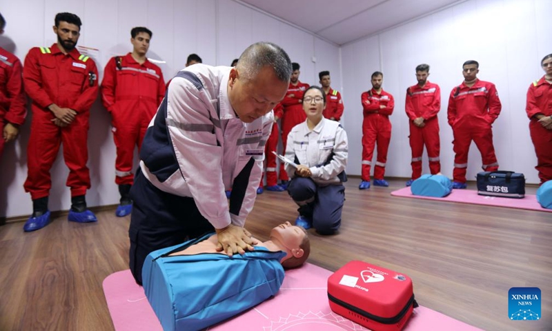 Medical personnel conduct first aid training at the Regional Health Service Center of Maysan Oilfield, Maysan, Iraq, Sept. 12, 2024. Invested and built by China Oilfield Services Limited Iraq Branch, the Regional Health Service Center of Maysan Oilfield in Iraq was officially put into operation in 2023. In order to ensure the safety of Iraqi and Chinese workers, the center has carried out emergency rescue training for about 800 people so far. (Photo: Xinhua)