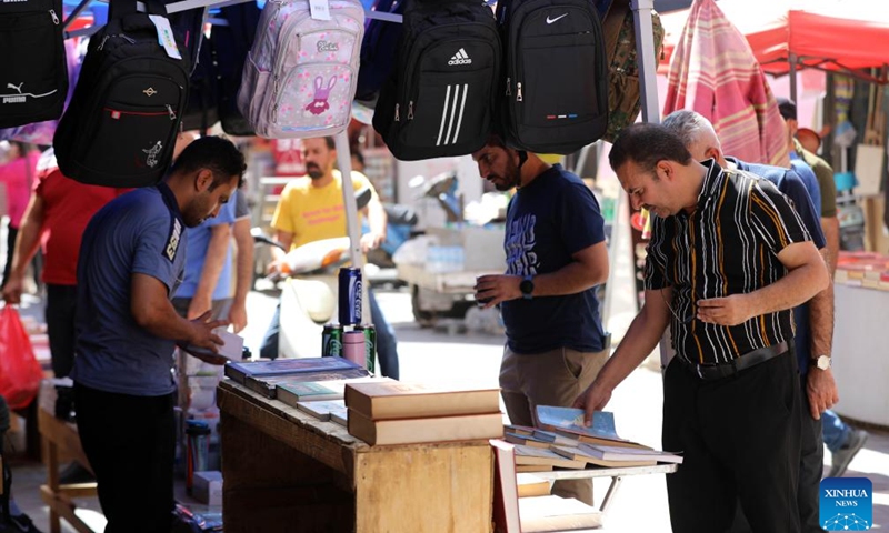 Customers buy school supplies in preparation for the new school year in Baghdad, Iraq, Sept. 19, 2024. (Photo: Xinhua)