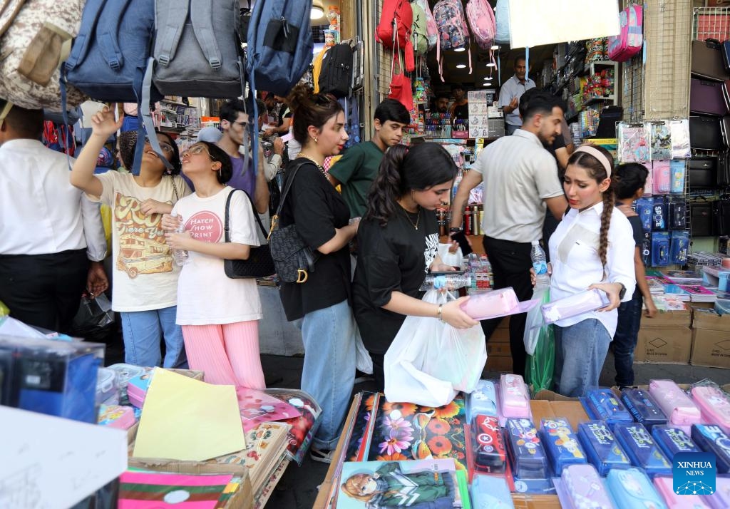 Customers buy school supplies in preparation for the new school year in Baghdad, Iraq, Sept. 19, 2024. (Photo: Xinhua)