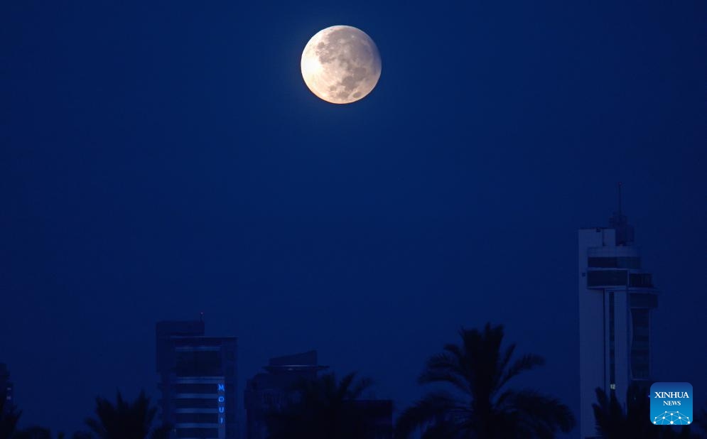 The moon is seen in the sky over Kuwait City, Kuwait, on Sept. 18, 2024. (Photo: Xinhua)