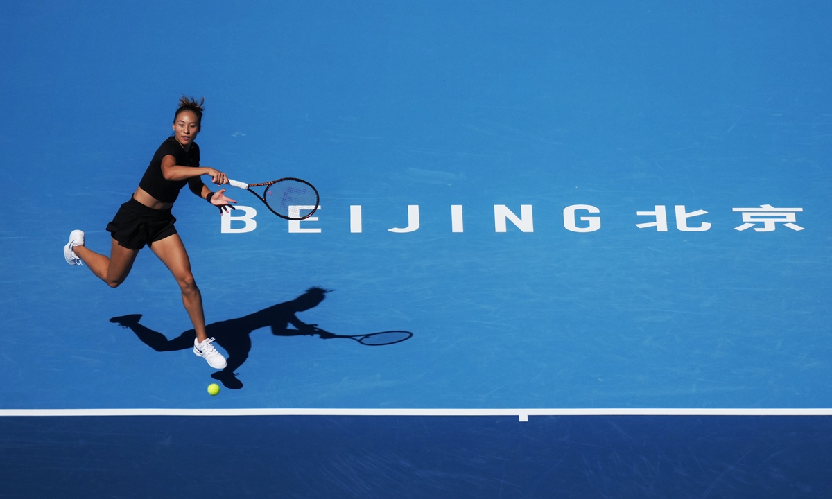 Zheng Qinwen in action during a training session on Sunday at the Diamond Court at the National Tennis Center in Beijing  Photo: VCG