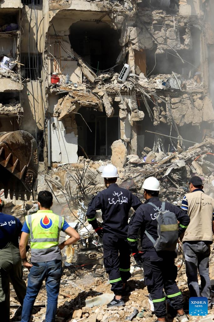 Rescuers work at the site of an Israeli attack in Beirut, Lebanon, on Sept. 21, 2024. At least 31 people, including three children and seven women, were killed in the Israeli attack on Beirut on Friday, Lebanese Minister of Public Health Firass Abiad said on Saturday.  (Photo: Xinhua)