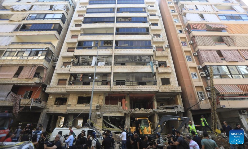 Rescuers work at the site of an Israeli attack in Beirut, Lebanon, on Sept. 21, 2024. At least 31 people, including three children and seven women, were killed in the Israeli attack on Beirut on Friday, Lebanese Minister of Public Health Firass Abiad said on Saturday. (Photo: Xinhua)