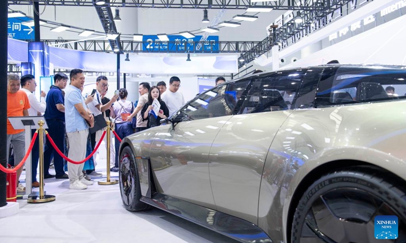 Visitors learn about a concept car displayed at the 2024 World Manufacturing Convention in Hefei, east China's Anhui Province, Sept. 21, 2024. The 2024 World Manufacturing Convention opened Friday in Hefei, capital of east China's Anhui Province, highlighting the latest products and innovations in the manufacturing sector. (Photo: Xinhua)