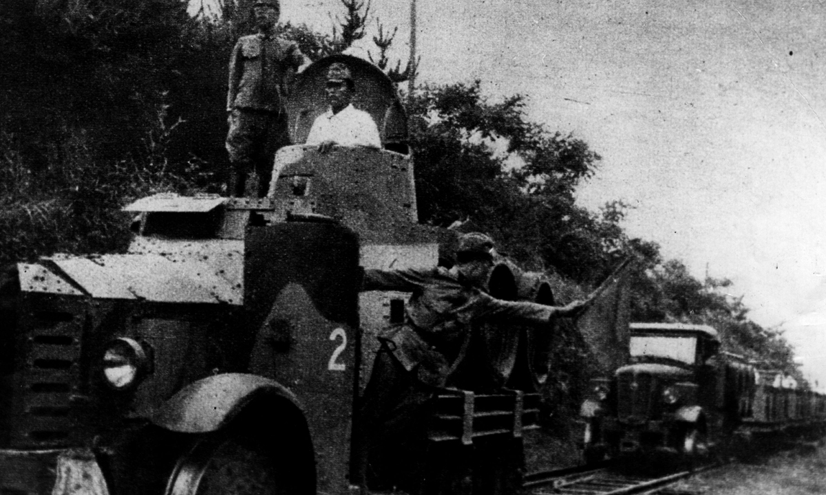 Japanese soldiers drive a truck in Malaya in 1944. Photo: VCG 