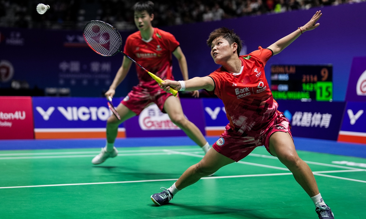 China's Huang Dongping (right) returns a shot in the mixed doubles final with teammate Feng Yanzhe against Malaysia's Goh Soon Huat and Shevon Jemie Lai during the China Open badminton event on September 22, 2024, in Changzhou, East China's Jiangsu Province. The Chinese duo claimed the title with a 16-21, 21-14, 21-17 victory. Photo: VCG