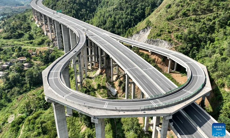 An aerial drone photo shows the Huohua grand bridge on the expressway linking Ziyun and Wangmo in southwest China's Guizhou Province, Sept. 5, 2024. Guizhou, with 92.5 percent of its area filled with mountains and hills, has been committed to eliminating bottlenecks in land transportation. Currently, the province has built over 200,000 km of highways, including more than 8,000 kilometers of expressways in operation. (Photo: Xinhua)