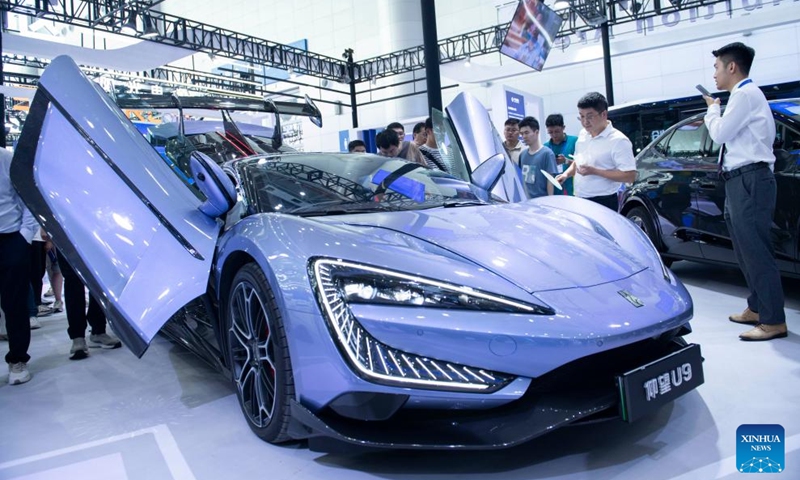 Visitors learn about a BYD Yangwang U9 at the 2024 World Manufacturing Convention in Hefei, east China's Anhui Province, Sept. 20, 2024. The 2024 World Manufacturing Convention opened Friday in Hefei, capital of east China's Anhui Province, highlighting the latest products and innovations in the manufacturing sector. (Photo: Xinhua)