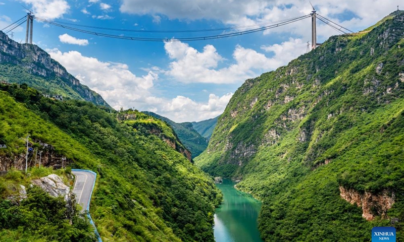 A drone photo taken on Sept. 3, 2024 shows the Huajiang Grand Canyon Bridge under construction in southwest China's Guizhou Province. Guizhou, with 92.5 percent of its area filled with mountains and hills, has been committed to eliminating bottlenecks in land transportation. Currently, the province has built over 200,000 km of highways, including more than 8,000 kilometers of expressways in operation. (Photo: Xinhua)