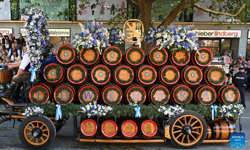 A wagon of a local beer brand takes part in a parade during the official opening of the Oktoberfest in Munich, Germany, Sept. 21, 2024.

The 189th Oktoberfest, one of the largest folk festivals in Germany, opened on Saturday in Munich, with mayor Dieter Reiter tapping the first barrel of beer as a tradition. This year's festival will last until Oct. 6. (Photo: Xinhua)