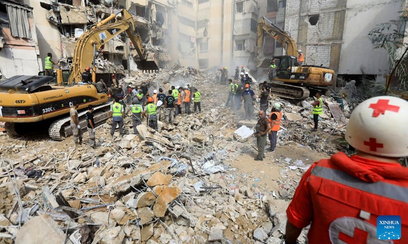 Rescuers work at the site of an Israeli attack in Beirut, Lebanon, on Sept. 21, 2024. At least 31 people, including three children and seven women, were killed in the Israeli attack on Beirut on Friday, Lebanese Minister of Public Health Firass Abiad said on Saturday. (Photo: Xinhua)