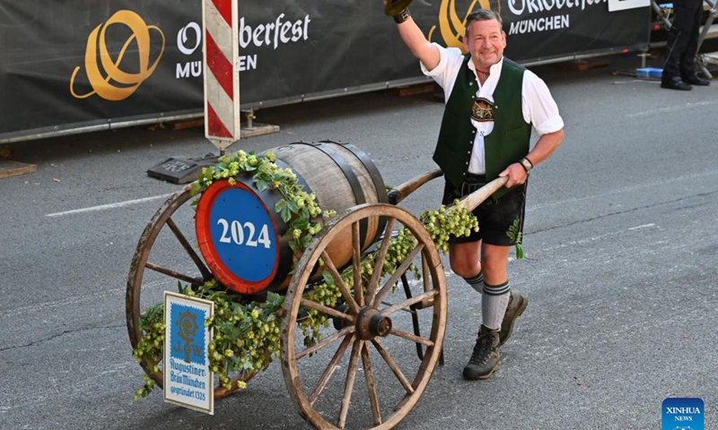 A man takes part in a parade during the official opening of the Oktoberfest in Munich, Germany, Sept. 21, 2024.

The 189th Oktoberfest, one of the largest folk festivals in Germany, opened on Saturday in Munich, with mayor Dieter Reiter tapping the first barrel of beer as a tradition. This year's festival will last until Oct. 6. (Photo: Xinhua)