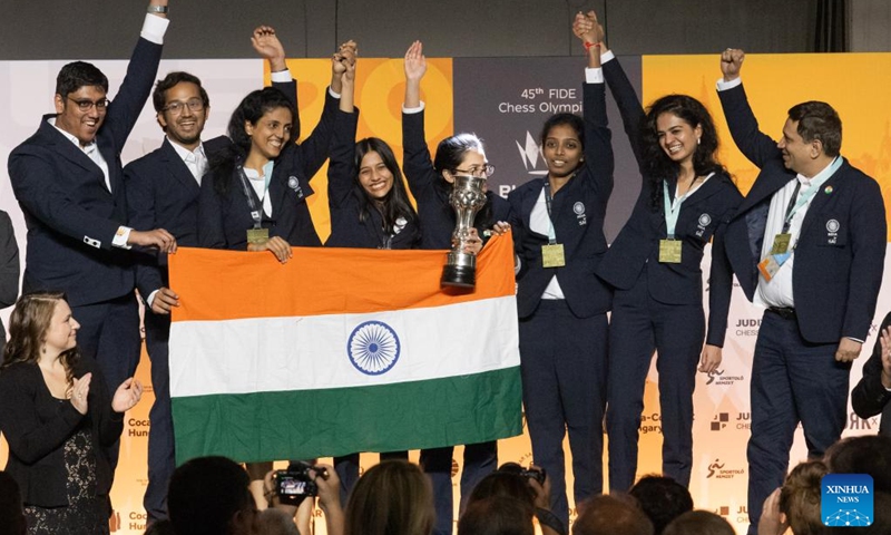 Members of gold medalist team India celebrate their victory at the awards ceremony of the Women's category of the 45th FIDE Chess Olympiad Budapest 2024 in Budapest, Hungary on Sept. 22, 2024. (Photo: Xinhua)