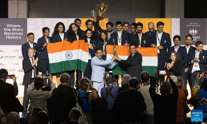 Members of gold medalist team India celebrate their victory at the awards ceremony of the 45th FIDE Chess Olympiad Budapest 2024 in Budapest, Hungary on Sept. 22, 2024. (Photo: Xinhua)