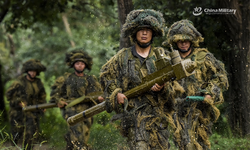 Airmen assigned to a portable air-defense detachment of a ground-to-air missile brigade under the Chinese PLA Central Theater Command run to the designated area for a special training exercise on July 31, 2024. (Photo: China Military Online)