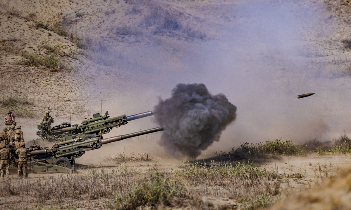 US and Philippine troops fire howitzers as they take part in a counter landing live fire exercise as part of US-Philippines joint military exercises on May 6, 2024, in Laoag, the Philippines. Photo: VCG