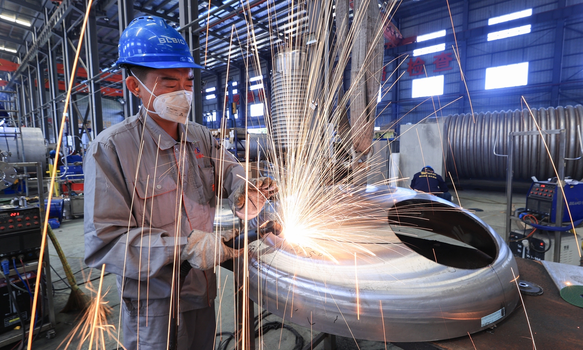 A worker welds a product at a bioreactor factory in Lianyungang, East China's Jiangsu Province, on September 23, 2024. Local government has been conducting a series of measures such as financing facilitation and talent introduction, ensuring the high-quality development of local companies in emerging industries. Photo: VCG