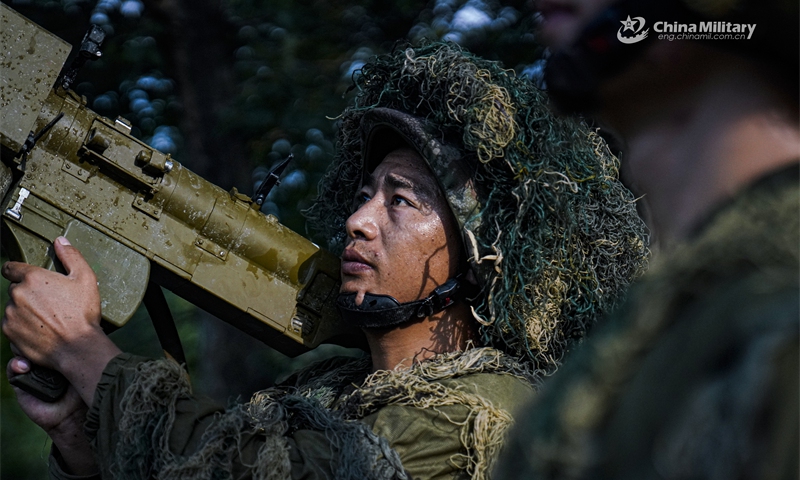 An airman assigned to a portable air-defense detachment of a ground-to-air missile brigade under the Chinese PLA Central Theater Command tracks the air target with a hand-held missile tube during a special training exercise on July 31, 2024. (Photo: China Military Online)