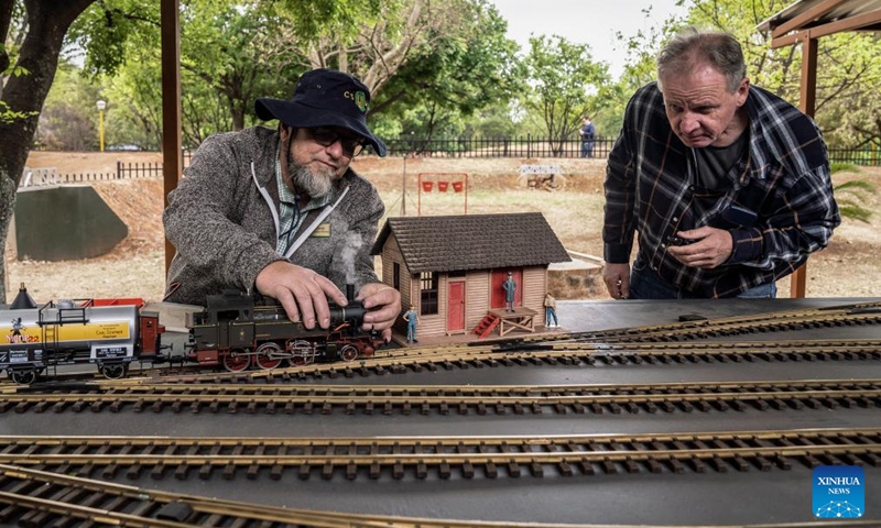 People view model trains at the Model Engineering Fair held in Centurion of Gauteng, South Africa, Sept. 22, 2024. The fair displays a variety of steam locomotives and other model trains. (Photo: Xinhua)