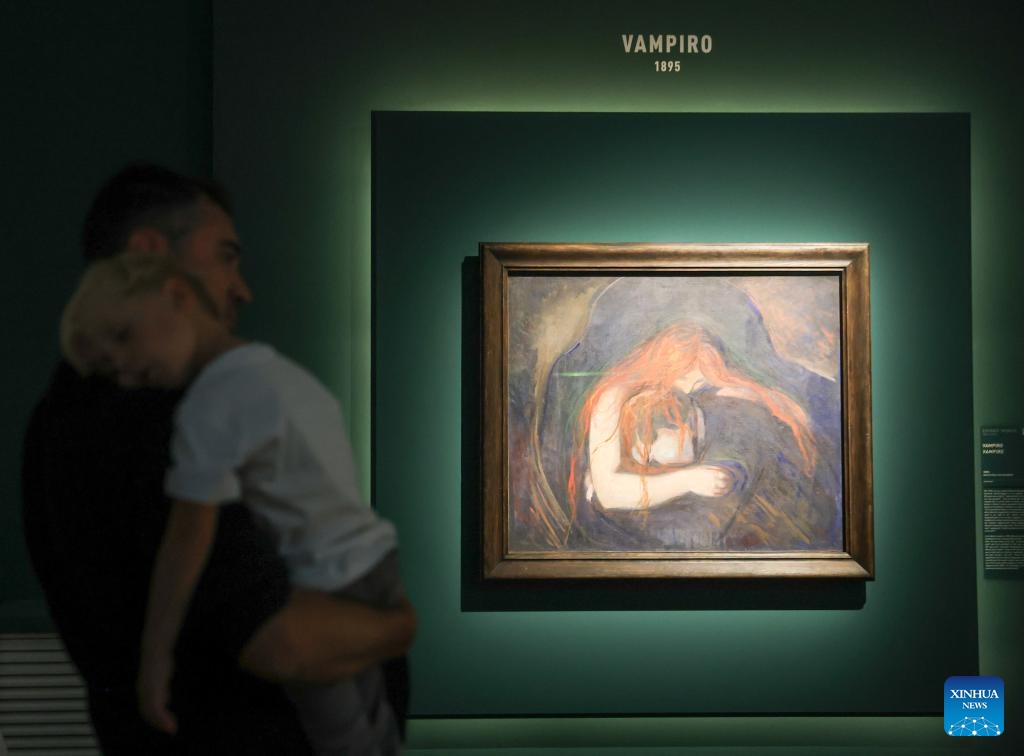 A visitor views a work of Edvard Munch at the exhibition Munch, Il Grido Interiore in the Royal Palace of Milan in Milan, Italy, Sept. 22, 2024. (Photo: Xinhua)