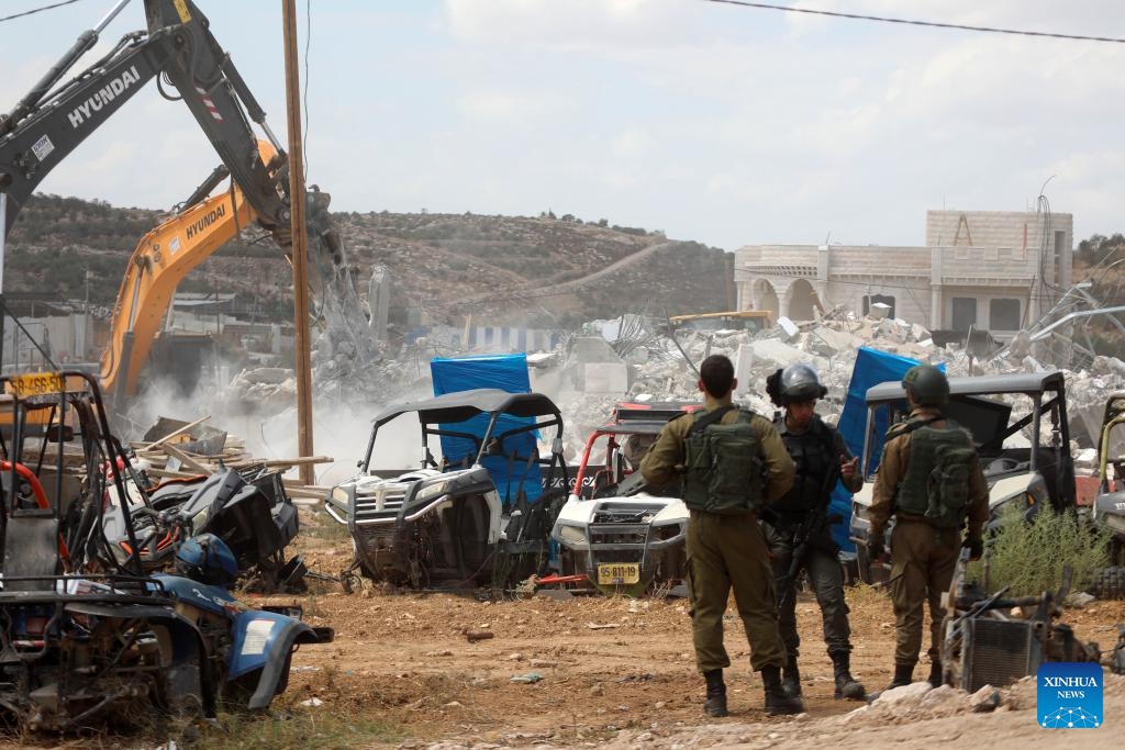 Israeli bulldozers demolish a Palestinian residential house in the village of Idna, west of the West Bank city of Hebron, on Sept. 23, 2024. (Photo: Xinhua)