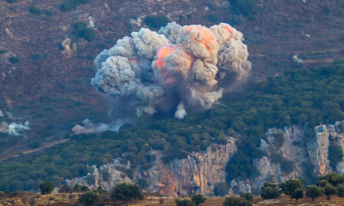 Smoke billows from the site of an Israeli airstrike in Marjayoun, near the Lebanon-Israel border, on September 23, 2024. The Israeli military on September 23 told people in Lebanon to move away from Hezbollah targets and vowed to carry out more 