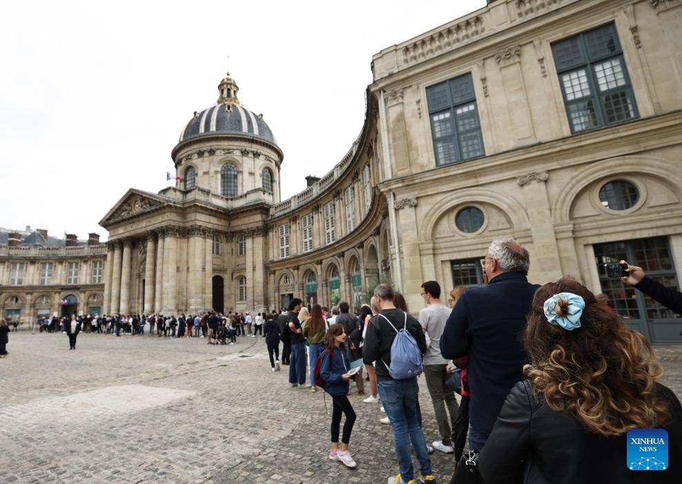 People line up in front of the Institut de France in Paris, France, Sept. 22, 2024. The two-day European Heritage Days kicked off here Saturday, during which nearly 20,000 historical sites in France were opened to the public for free. (Photo: Xinhua)