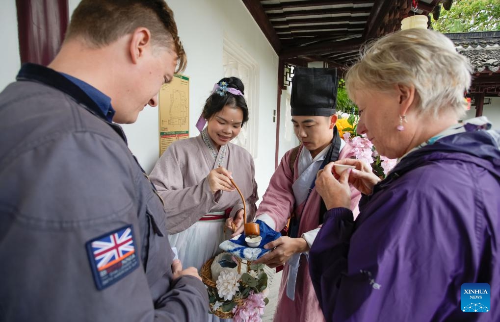 People taste Chinese tea during the Garden Tea Festival at Dr. Sun Yat-Sen Classical Chinese Garden in Vancouver, British Columbia, Canada, Sept. 22, 2024. (Photo: Xinhua)