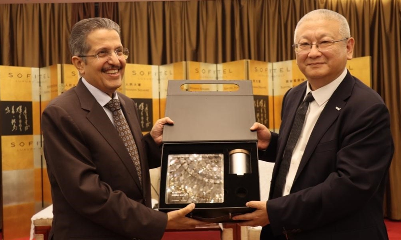 Li Zhenguo (right), founder and president of LONGi Green Energy, meets with Mohammed Abunayyan, founder and chairman of Saudi International Power and Water Company (ACWA Power), and his delegation in Xi'an, on September 19, 2024.