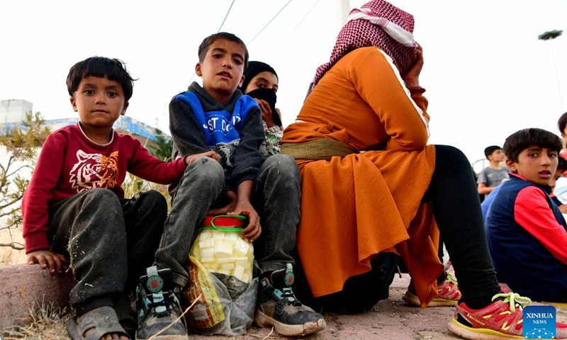 People fleeing from Lebanon are seen at the Jdeidat Yabous border crossing in the countryside of Damascus, Syria, on Sept. 24, 2024. Syrian authorities are facilitating entry at border crossings for both Lebanese and returning Syrian nationals, local media outlet Al-Watan Online reported on Tuesday. (Photo: Xinhua)