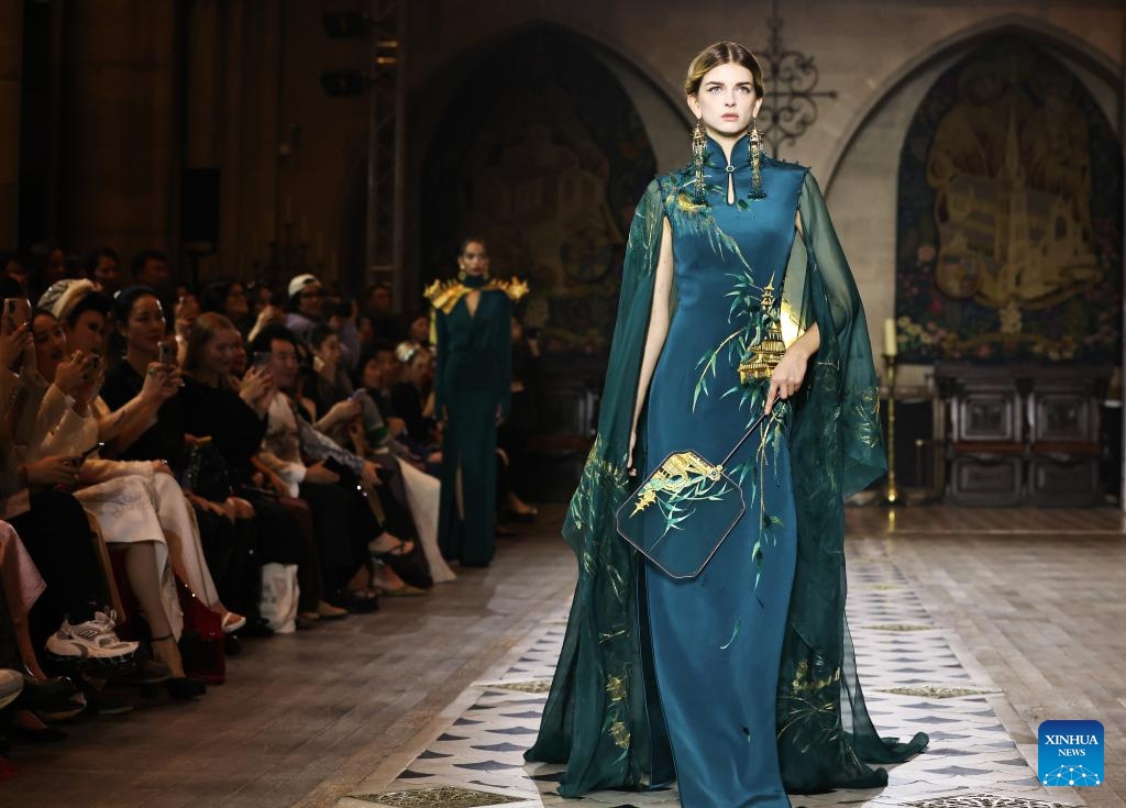 A model presents a creation of the Heaven Gaia Moon Spring/Summer 2025 collections by Chinese fashion designer Xiong Ying during Paris Fashion Week in Paris, France, Sept. 23, 2024. (Photo: Xinhua)