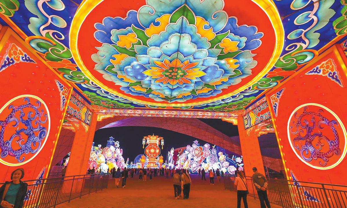 People enjoy a lantern-themed event at the Beijing Garden Expo Park in Yanqing district of Beijing on September 25, 2024. The event features nine major exhibition areas, displaying over 200 sets of lanterns. It also sets up several specialty shops and hosts more than 20 activities and interactive events to celebrate the upcoming National Day holidays. Photo: VCG