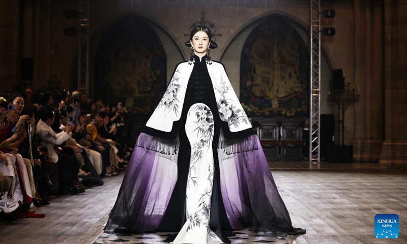 A model presents a creation of the Heaven Gaia Moon Spring/Summer 2025 collections by Chinese fashion designer Xiong Ying during Paris Fashion Week in Paris, France, Sept. 23, 2024. (Photo: Xinhua)