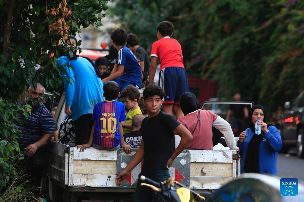 Displaced Lebanese flee the Israeli bombing of southern Lebanon in Sidon, Lebanon, on Sept. 23, 2024. (Photo: Xinhua)