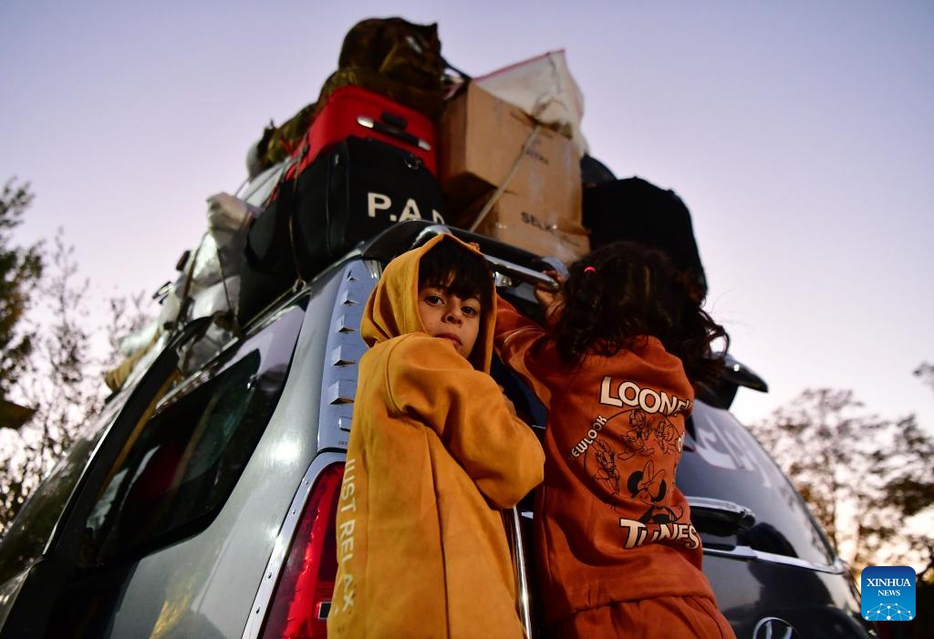 People fleeing from Lebanon are seen at the Jdeidat Yabous border crossing in the countryside of Damascus, Syria, on Sept. 24, 2024. Syrian authorities are facilitating entry at border crossings for both Lebanese and returning Syrian nationals, local media outlet Al-Watan Online reported on Tuesday. (Photo: Xinhua)