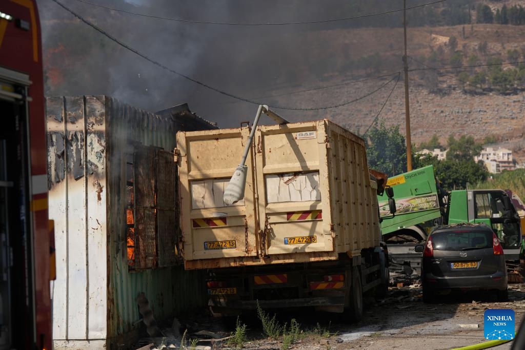 Photo taken on Sept. 24, 2024 shows a warehouse hit by a rocket from Lebanon, in Kiryat Shmona, northern Israel. The Israeli military reported that Hezbollah had resumed rocket fire on northern Israel, launching about 95 rockets since early Tuesday, with dozens landing in the cities of Kiryat Shmona, Nahariya, Afula, Nazareth, and Migdal Ha'emek. (Photo: Xinhua)