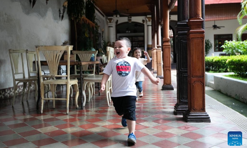 This photo taken on Sept. 22, 2024 shows kids running in the Dario Hotel in Granada, Nicaragua. Granada, located on the shores of the Nicaragua Lake, is the first city established by the Spanish people in Nicaragua and one of the oldest colonial cities in Central America (Photo: Xinhua)