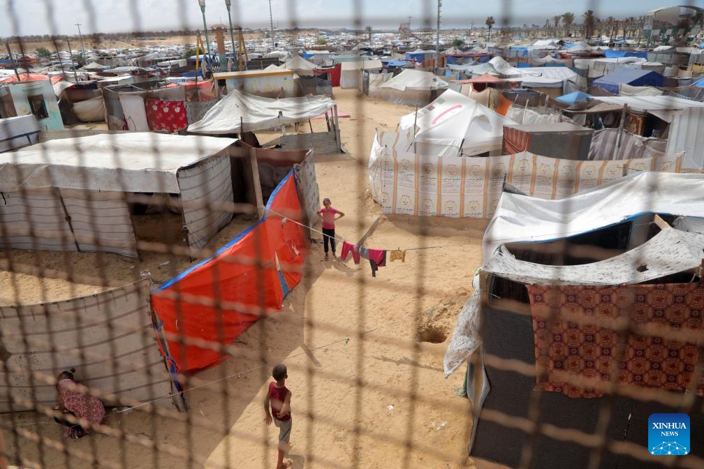 Photo taken on Sept. 23, 2024 shows a temporary shelter in the southern Gaza Strip city of Khan Younis. If international organizations cannot provide us with tents, we face a harsh winter that could lead to the deaths of refugees due to the cold and lack of shelter, Om Fadi said. (Photo: Xinhua)