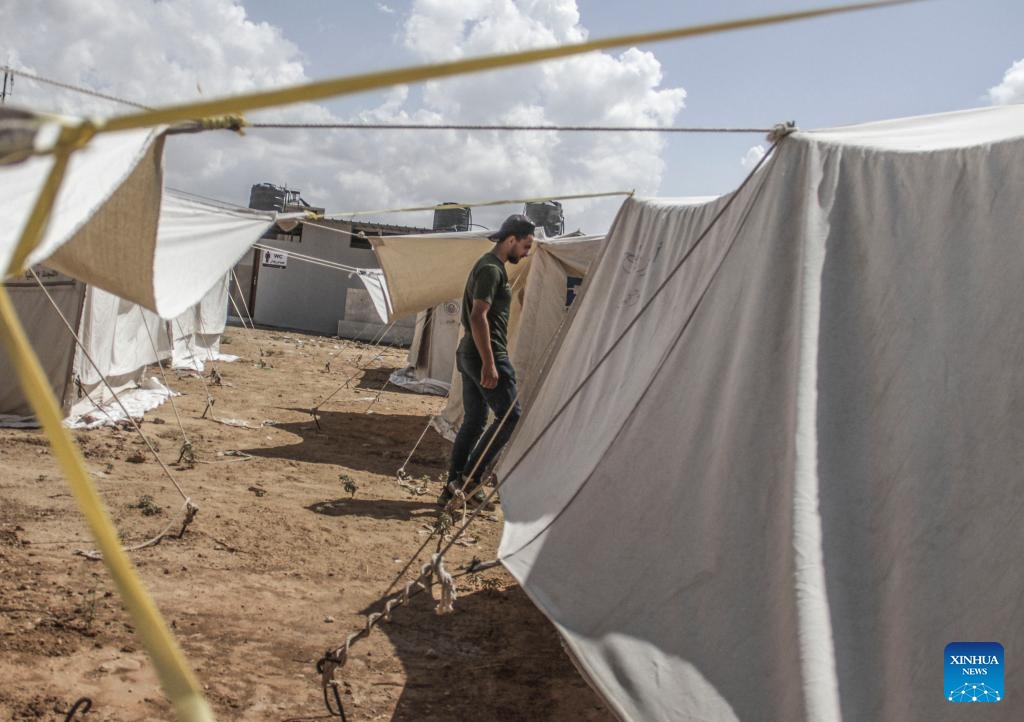 A man walks at a temporary shelter in the northern Gaza Strip city of Jabalia, on Sept. 22, 2024. (Photo: Xinhua)