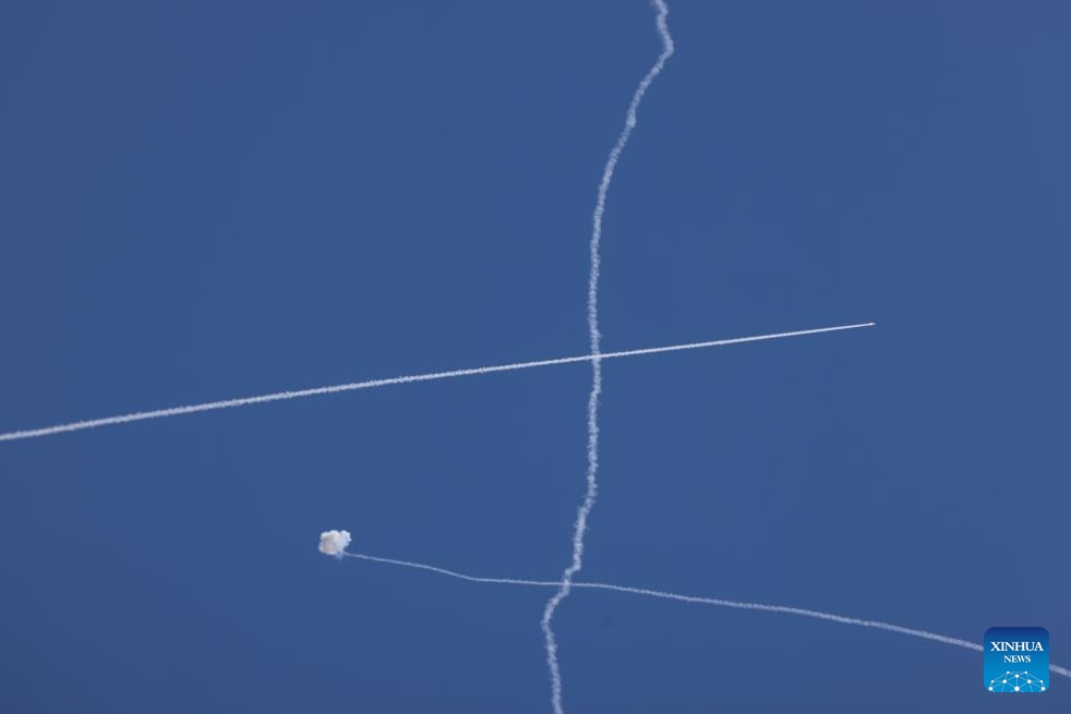 An Israeli anti-missile system intercepts rockets fired from Lebanon, as seen from Safed, northern Israel, on Sept. 25, 2024. Cross-border fire continued on Wednesday, with Israeli forces heavily bombing the Nabatieh area in southern Lebanon and the Bekaa Valley. Hezbollah responded by firing at least 40 rockets into Israel, including a longer-range missile that triggered air raid sirens in central Israel, including Tel Aviv. (Photo: Xinhua)