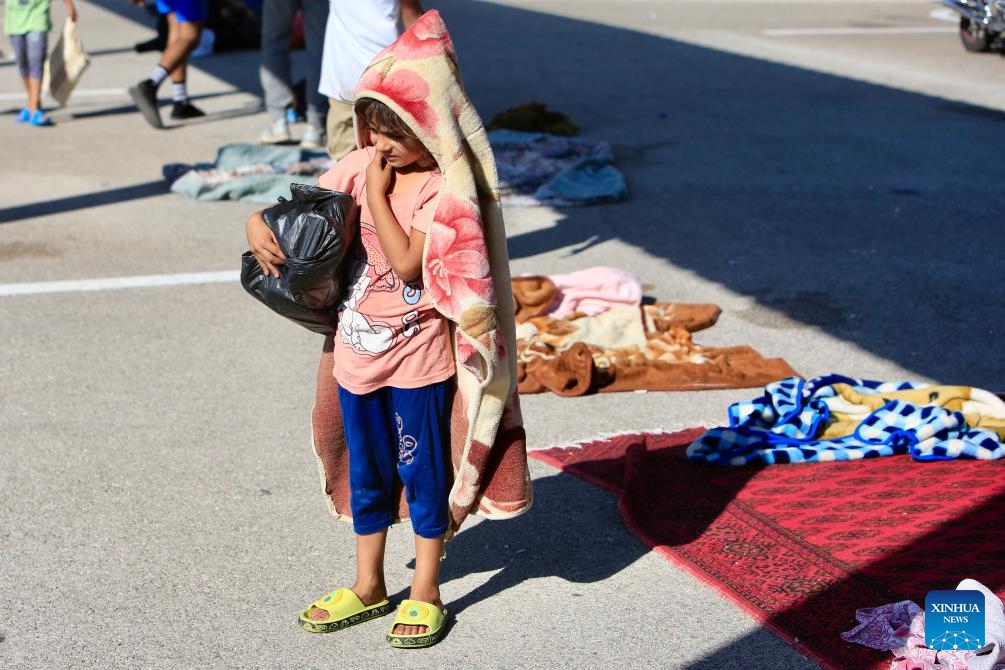 A displaced girl is seen in a school in Sidon, South Lebanon, on Sept. 25, 2024. Since Monday, Israel has conducted its most extensive attacks on Lebanon since 2006, resulting in more than 550 deaths and over 1,835 injuries across the country. The bombardment has also displaced many residents. (Photo: Xinhua)