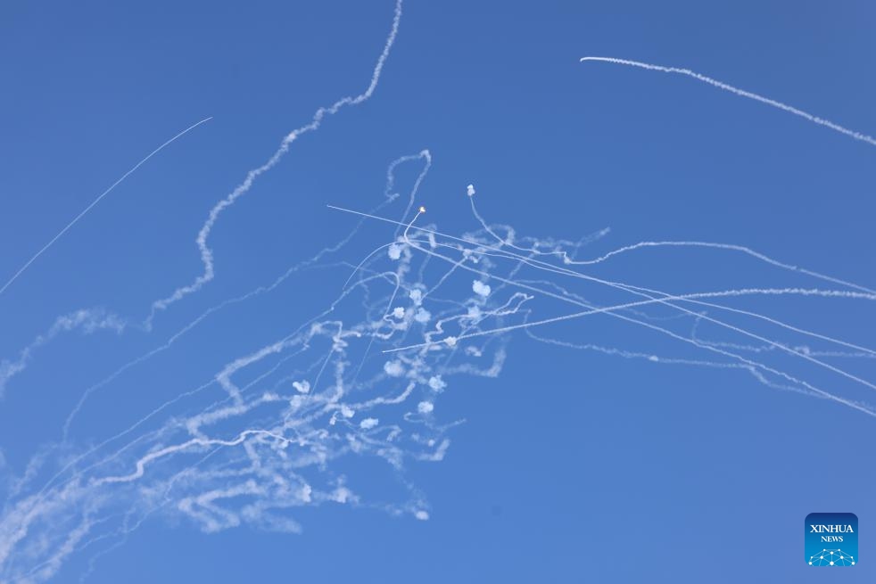 Smoke traces are seen as an Israeli anti-missile system intercepts rockets fired from Lebanon, as seen from Safed,northern Israel, on Sept. 25, 2024. Cross-border fire continued on Wednesday, with Israeli forces heavily bombing the Nabatieh area in southern Lebanon and the Bekaa Valley. Hezbollah responded by firing at least 40 rockets into Israel, including a longer-range missile that triggered air raid sirens in central Israel, including Tel Aviv. (Photo: Xinhua)