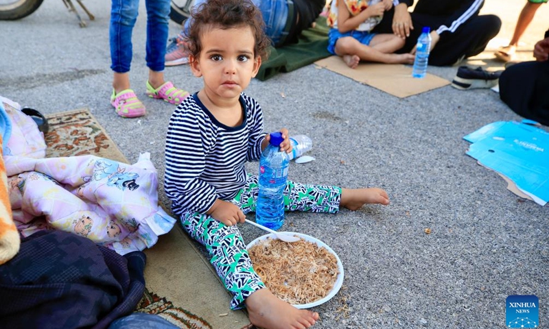 A displaced child is seen in a school in Sidon, South Lebanon, on Sept. 25, 2024. Since Monday, Israel has conducted its most extensive attacks on Lebanon since 2006, resulting in more than 550 deaths and over 1,835 injuries across the country. The bombardment has also displaced many residents. (Photo: Xinhua)