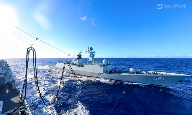 Comprehensive supply ship Luomahu (Hull 964) attached to a navy flotilla under the PLA Southern Theater Command provides liquid supply to Type-054A guided missile frigate Bayannaoer (Hull 551) via alongside replenishment-at-sea during a comprehensive logistic exercise on August 6, 2024. (eng.chinamil.com.cn/Photo by Li Junlin)  