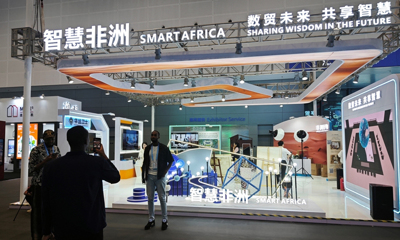 Attendees take photo in front of a booth promoting African digital trade at the expo in Hangzhou, East China's Zhejiang Province, on September 27, 2024. Photo: Yin Yeping/GT
