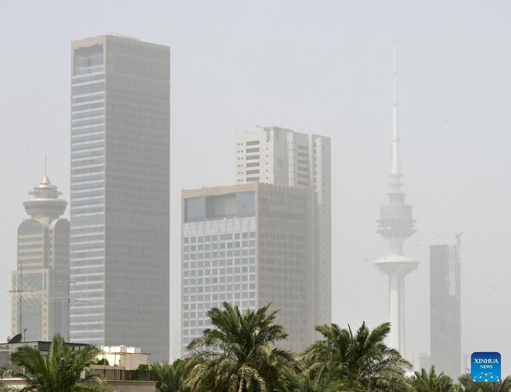 This photo taken on Sept. 26, 2024 shows buildings in a strong dust storm in Kuwait City, Kuwait. (Photo: Xinhua)