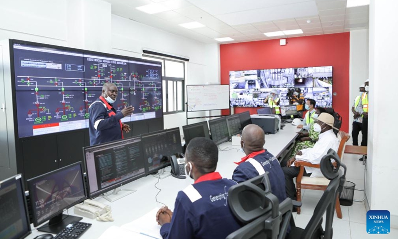 Ugandan President Yoweri Museveni (in white) is briefed during the commissioning of the Chinese-built 600-megawatt Karuma Hydropower Station in Kiryandongo, Uganda, Sept. 26, 2024. Ugandan President Yoweri Museveni has commissioned the Chinese-built 600-megawatt Karuma Hydropower Station and the Karuma Interconnection Project in the midwestern Ugandan district of Kiryandongo. (Photo: Xinhua)