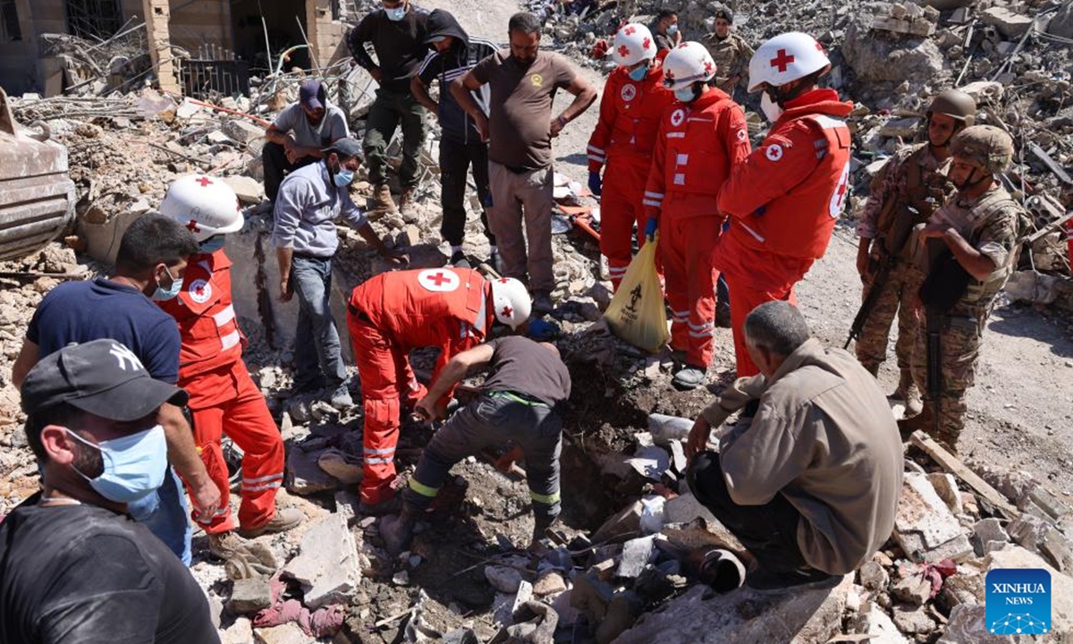 People search among the rubble after an Israeli airstrike in Shebaa, Lebanon, on Sept. 27, 2024. Nine people were killed early Friday in an Israeli airstrike on the southeastern Lebanese town of Shebaa, the Lebanese Health Ministry said. (Photo: Xinhua)