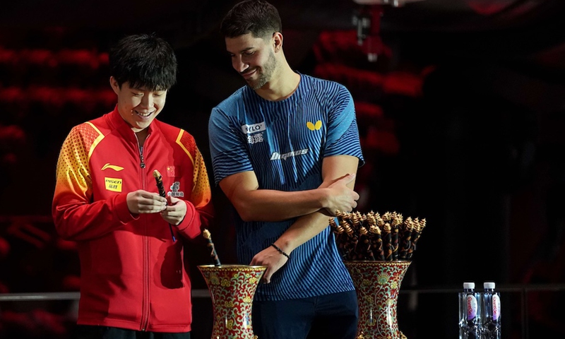 China's Wang Chuqin (left) attends the draw ceremony on September 27 in Beijing. Photo: Courtesy of worldtabletennis.com