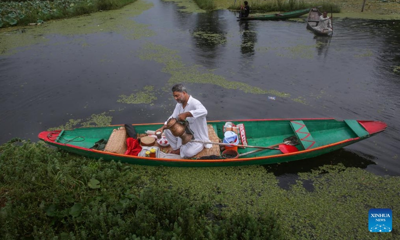 A man sells tea on his boat at Dal lake in Srinagar, the summer capital of Indian-controlled Kashmir, Sept. 27, 2024. (Photo: Xinhua)